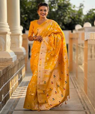 Yellow elegant art silk woven saree with rich zari border 1