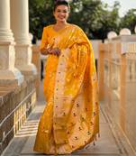 Yellow elegant art silk woven saree with rich zari border