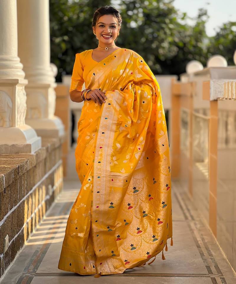 Yellow elegant art silk woven saree with rich zari border