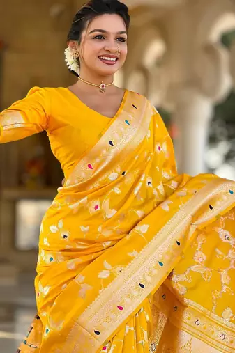 Yellow elegant art silk woven saree with rich zari border
