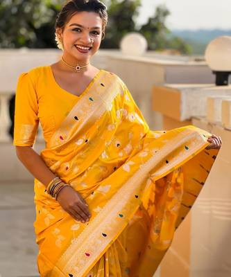 Yellow elegant art silk woven saree with rich zari border 4