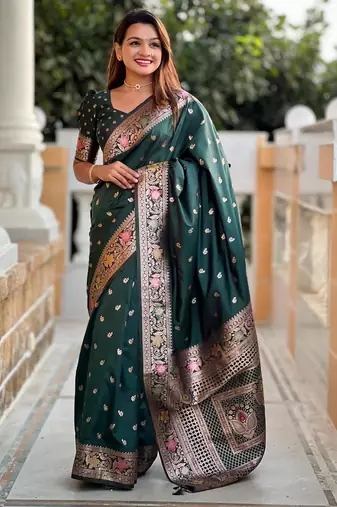 Green elegant art silk woven saree with rich zari border