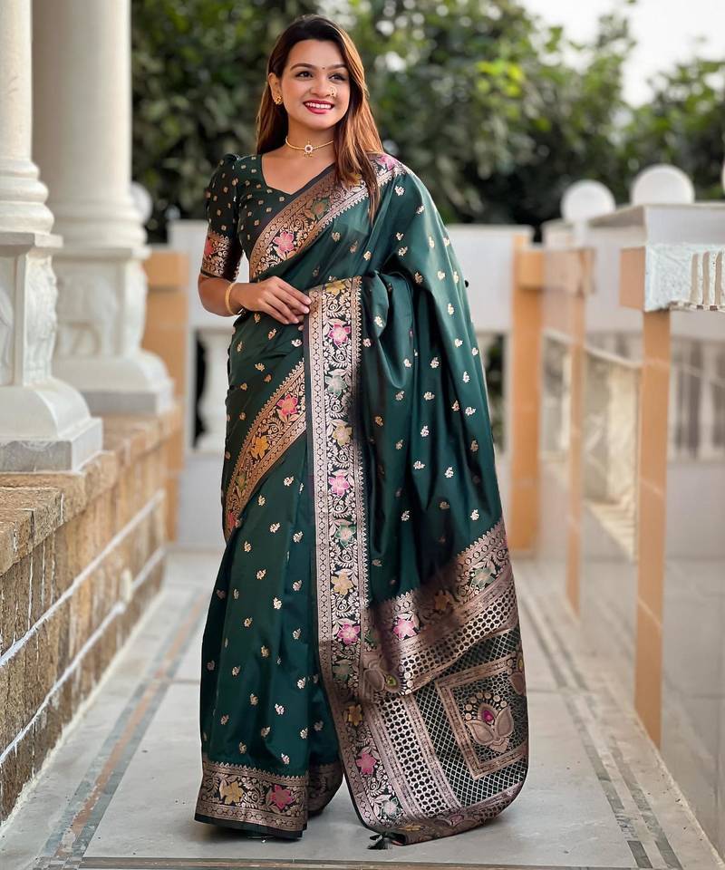 Green elegant art silk woven saree with rich zari border
