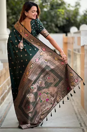 Green elegant art silk woven saree with rich zari border