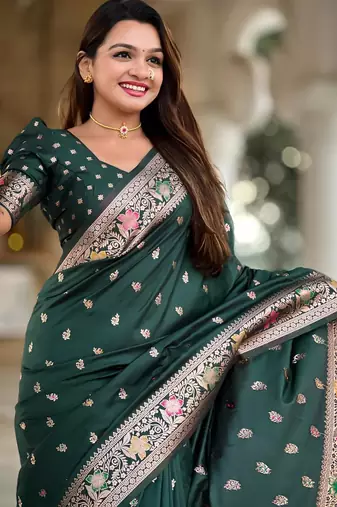 Green elegant art silk woven saree with rich zari border
