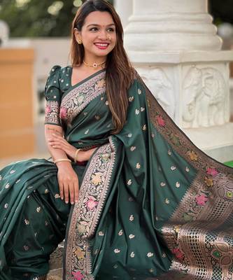 Green elegant art silk woven saree with rich zari border 5