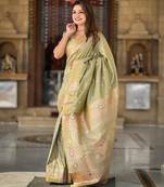Green elegant art silk woven saree with rich zari border
