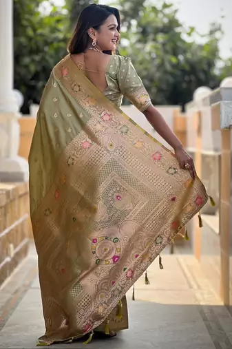 Green elegant art silk woven saree with rich zari border