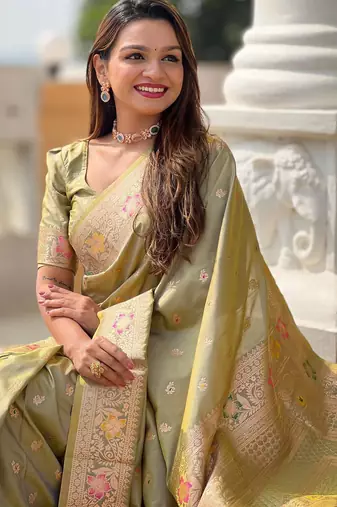 Green elegant art silk woven saree with rich zari border