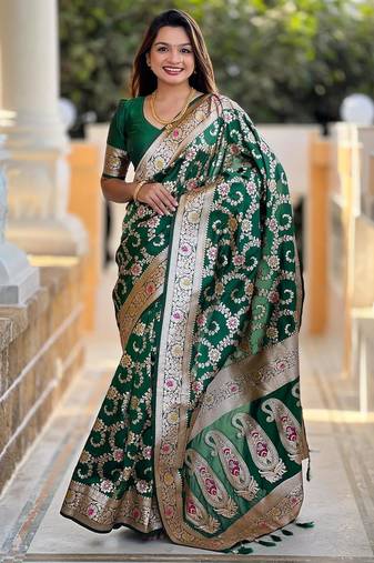 Green elegant art silk woven saree with rich zari border