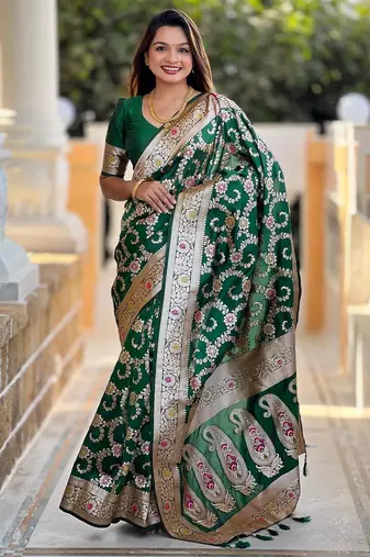 Green elegant art silk woven saree with rich zari border