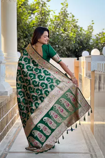 Green elegant art silk woven saree with rich zari border
