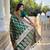 Green elegant art silk woven saree with rich zari border