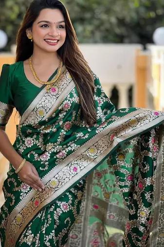 Green elegant art silk woven saree with rich zari border