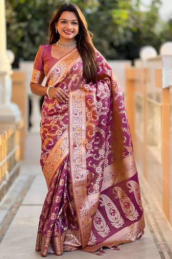 Onion pink elegant art silk woven saree with rich zari border