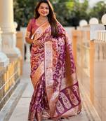 Onion pink elegant art silk woven saree with rich zari border