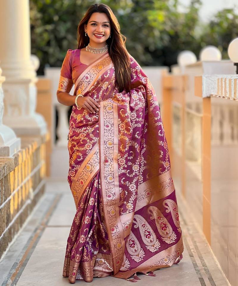 Onion pink elegant art silk woven saree with rich zari border