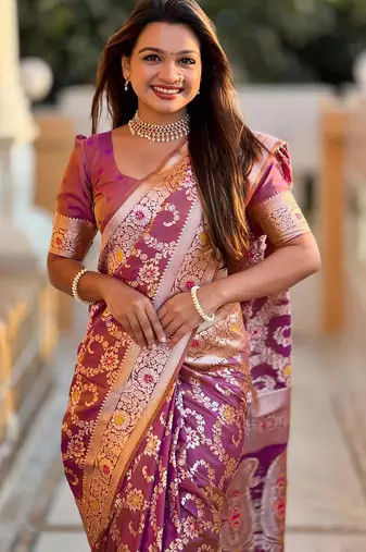 Onion pink elegant art silk woven saree with rich zari border