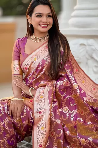 Onion pink elegant art silk woven saree with rich zari border