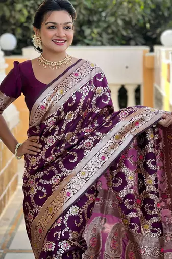 Wine elegant art silk woven saree with rich zari border