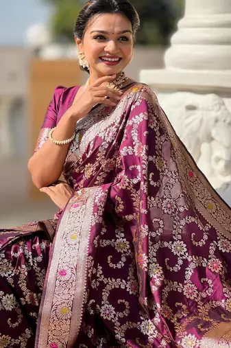 Wine elegant art silk woven saree with rich zari border