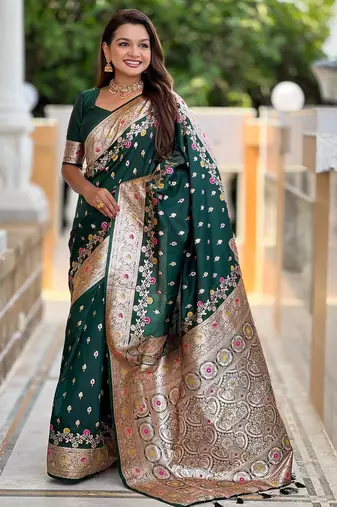 Green elegant art silk woven saree with rich zari border