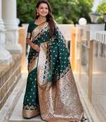 Green elegant art silk woven saree with rich zari border