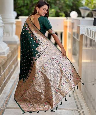 Green elegant art silk woven saree with rich zari border 2