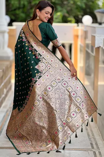 Green elegant art silk woven saree with rich zari border