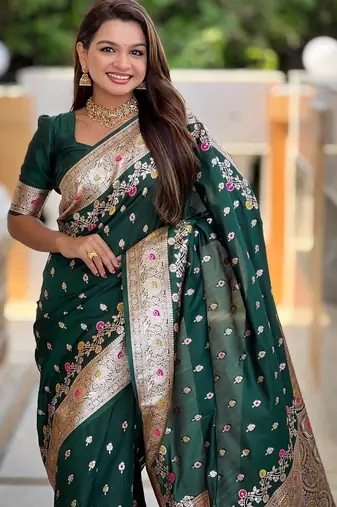 Green elegant art silk woven saree with rich zari border