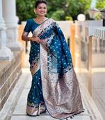 Turquoise elegant art silk woven saree with rich zari border