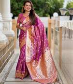 Onion pink elegant art silk woven saree with rich zari border