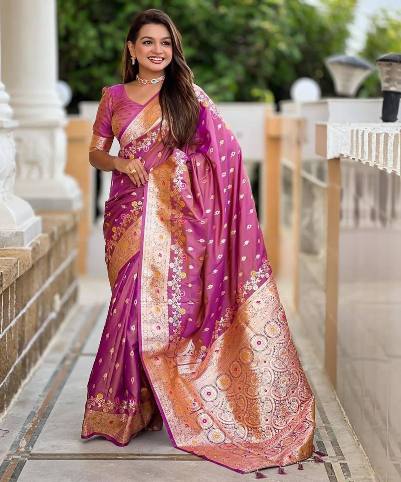 Onion pink elegant art silk woven saree with rich zari border
