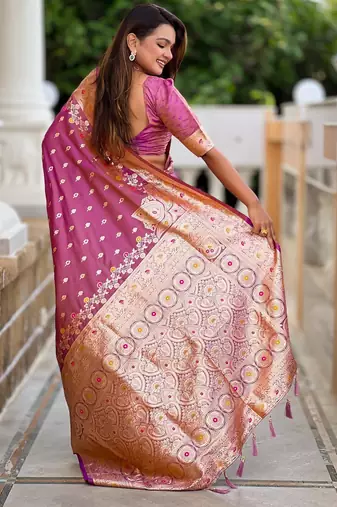 Onion pink elegant art silk woven saree with rich zari border