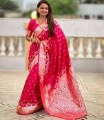 Pink elegant art silk woven saree with rich zari border
