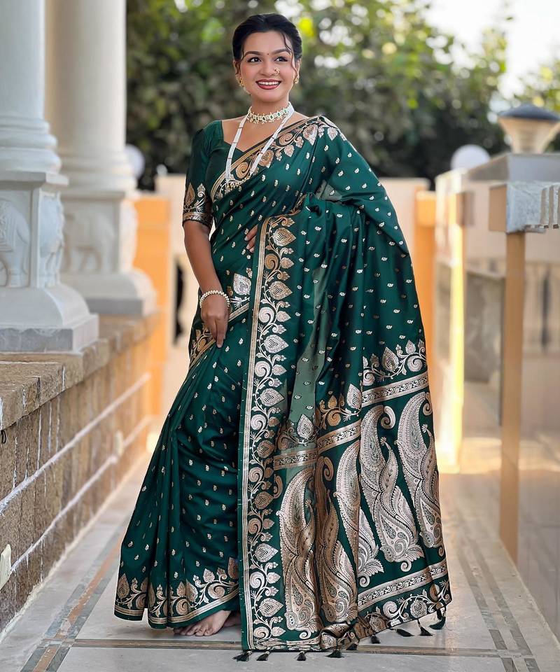 Green elegant art silk woven saree with rich zari border