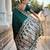 Green elegant art silk woven saree with rich zari border