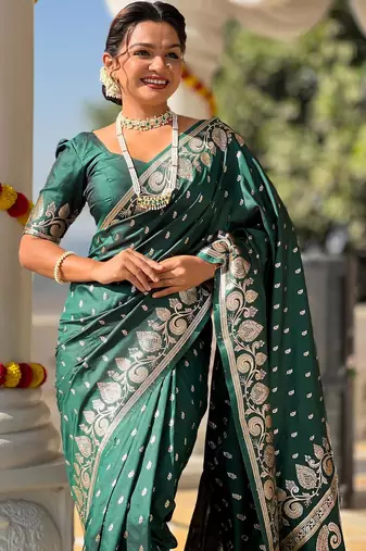 Green elegant art silk woven saree with rich zari border