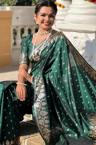 Green elegant art silk woven saree with rich zari border