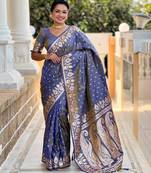 Grey elegant art silk woven saree with rich zari border
