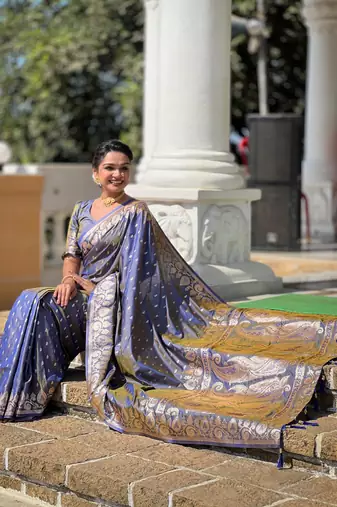 Grey elegant art silk woven saree with rich zari border