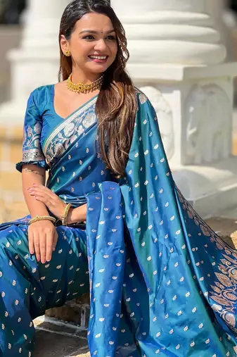 Turquoise elegant art silk woven saree with rich zari border
