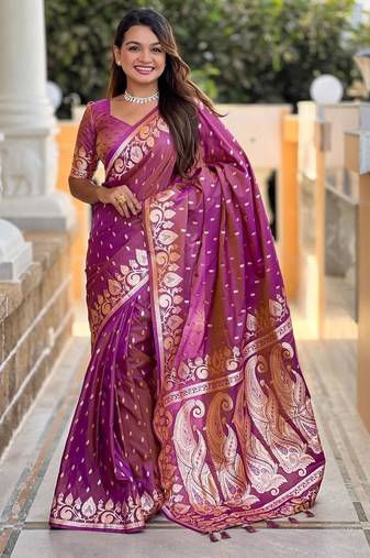 Onion pink elegant art silk woven saree with rich zari border