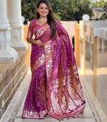 Onion pink elegant art silk woven saree with rich zari border