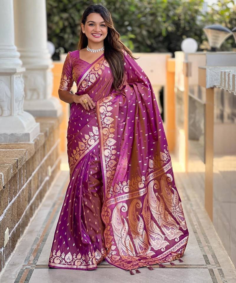 Onion pink elegant art silk woven saree with rich zari border
