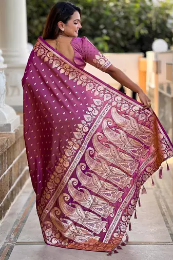 Onion pink elegant art silk woven saree with rich zari border