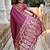 Onion pink elegant art silk woven saree with rich zari border