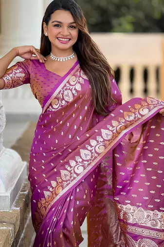 Onion pink elegant art silk woven saree with rich zari border