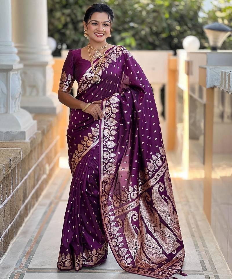 Wine elegant art silk woven saree with rich zari border