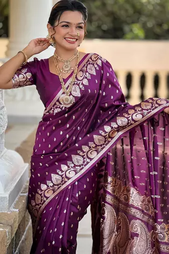 Wine elegant art silk woven saree with rich zari border